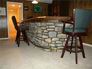 Bar after installation of stone veneer over red brick